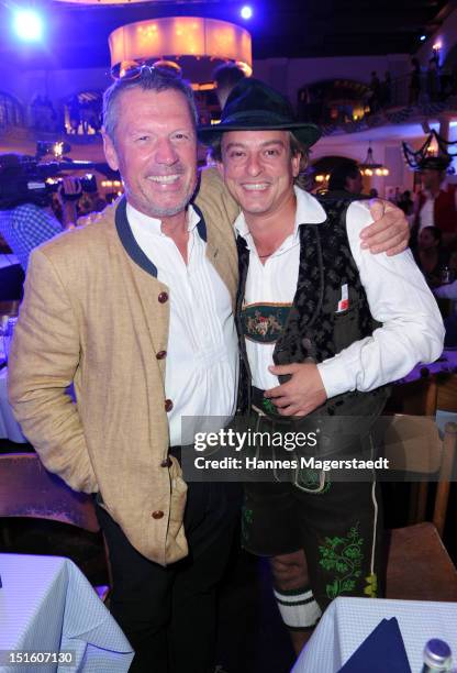 Actor Hansi Kraus and Florian Fischer attend the Angermaier Wiesn-Fashion Show at the Loewenbraeukeller on September 8, 2012 in Munich, Germany.