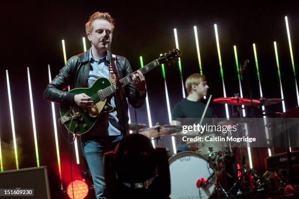 Alex Trimble and Benjamin Thompson of Two Door Cinema Club perform on stage at Bestival at Robin Hill Country Park on September 8, 2012 in Newport,...