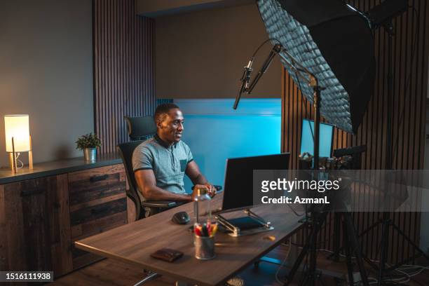 focused black male content creator at work - content creation stock pictures, royalty-free photos & images