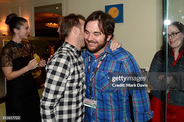 Actor Aaron Paul and director James Ponsoldt attend the Sony Pictures cocktail hour during the 2012 Toronto International Film Festival at the Creme...