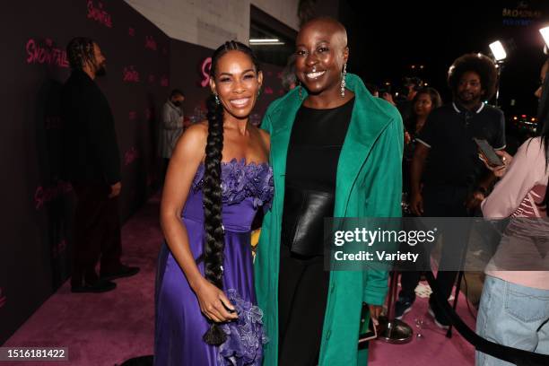 Angela Lewis and Christine Horn at the premiere of 'Snowfall' Season 5 held at Grandmaster Recorders on February 17, 2022 in Los Angeles, California.