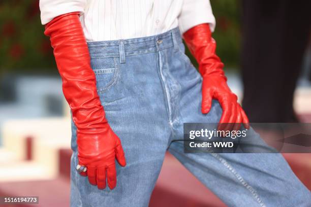 Kodi Smit-McPhee in red opera gloves from Bottega Veneta at The 2022 Met Gala celebrating In America: An Anthology of Fashion held at the The...