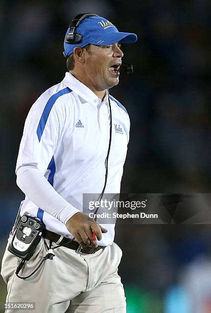 Head coach Jim Mora of the UCLA Bruins shouts instructions during the game against the Nebraska Cornhuskers at the Rose Bowl on September 8, 2012 in...