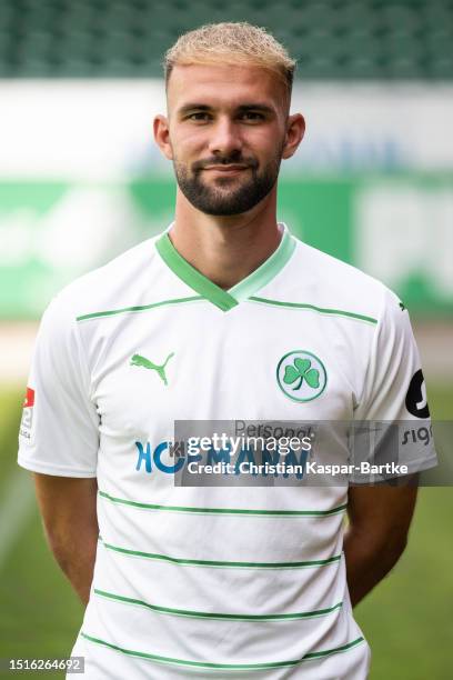 Simon Asta of SpVgg Greuther Fürth poses during the team presentation at Sportpark Ronhof Thomas Sommer on July 04, 2023 in Fuerth, Germany.