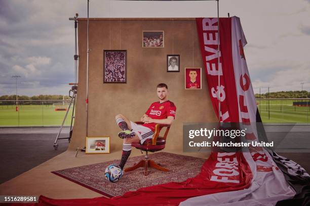 Mason Mount of Manchester United poses after signing for the club at Carrington Training Ground on July 05, 2023 in Manchester, England.