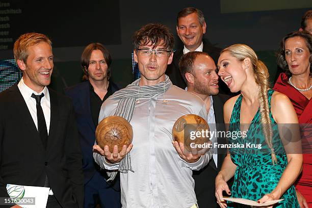 Jan Hahn, Morten Harket and Ruth Moschner attend the Clean Tech Media Award at Tempodrom on September 7, 2012 in Berlin, Germany.