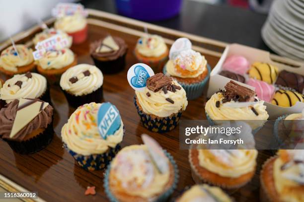 Cakes are prepared at an NHS 75 Big Tea anniversary event at Northallerton town hall on July 05, 2023 in Northallerton, England. The NHS was founded...