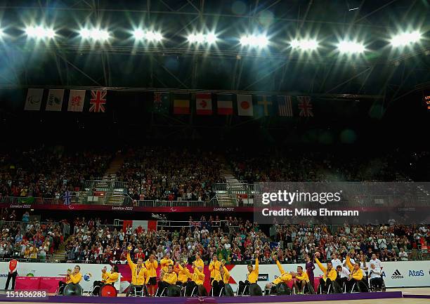 Members of team of Australia celebrate winning the Gold Medal match of Mixed Wheelchair Rugby against Canada on day 11 of the London 2012 Paralympic...