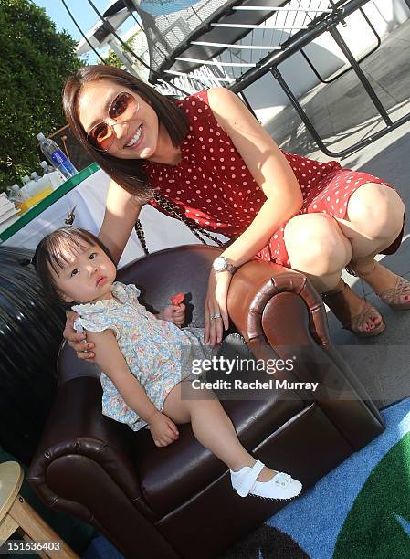 Suzie Ra and daughter Juliette Ra attend the Red CARpet event hosted by Britax and Ali Landry at SLS Hotel on September 8, 2012 in Beverly Hills,...