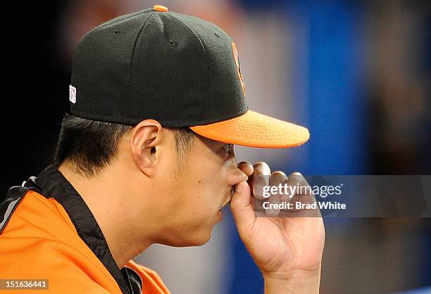 Wei-Yin Chen of the Baltimore Orioles looks on during MLB game action against the Toronto Blue Jays September 5, 2012 at Rogers Centre in Toronto,...