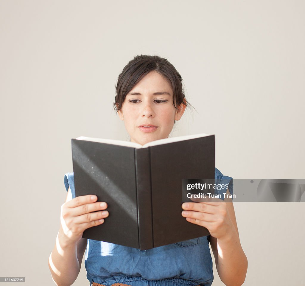 Woman reading book