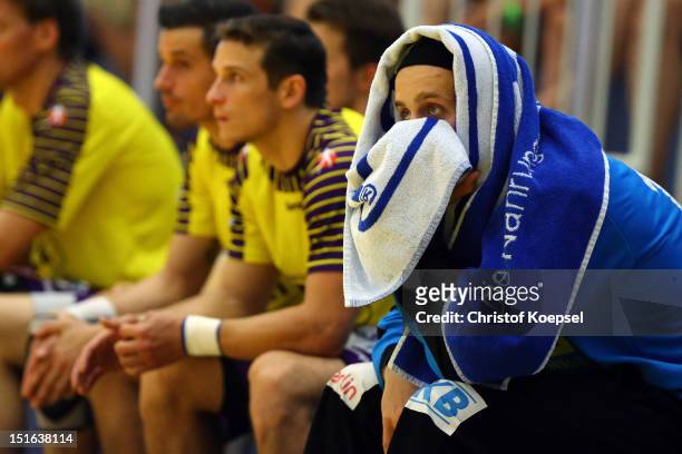 Silvio Heinevetter of Berlin sits on the bench during the DKB Handball Bundesliga match between TUSEM Essen and Fueches Berlin at the Sportpark Am...