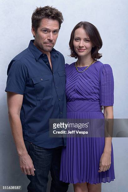 Actor Alexis Denisof and actress Amy Acker of "Much Ado About Nothing" pose at the Guess Portrait Studio during 2012 Toronto International Film...