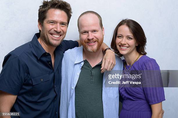 Actor Alexis Denisof, director Joss Whedon and actress Amy Acker of "Much Ado About Nothing" pose at the Guess Portrait Studio during 2012 Toronto...