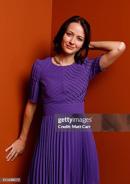 Actress Amy Acker of "Much Ado About Nothing" poses at the Guess Portrait Studio during 2012 Toronto International Film Festival on September 9, 2012...