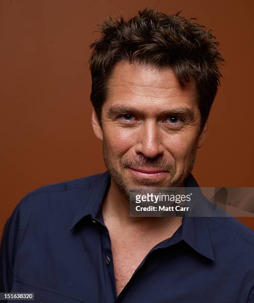 Actor Alexis Denisof of "Much Ado About Nothing" poses at the Guess Portrait Studio during 2012 Toronto International Film Festival on September 9,...