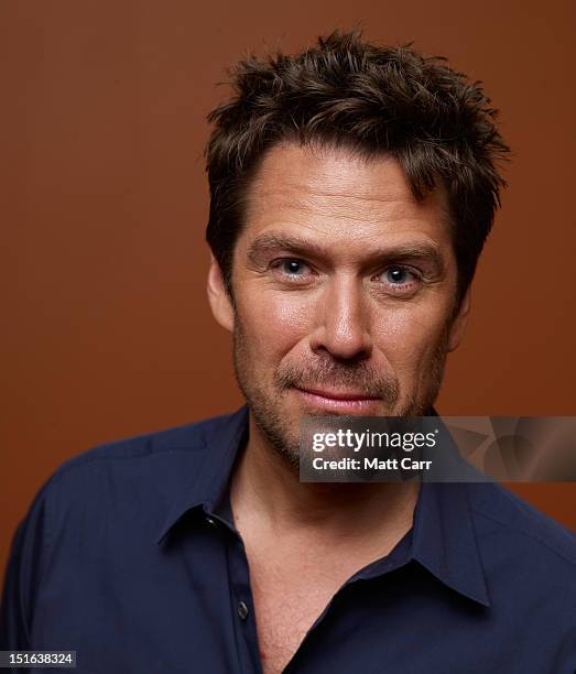 Actor Alexis Denisof of "Much Ado About Nothing" poses at the Guess Portrait Studio during 2012 Toronto International Film Festival on September 9,...