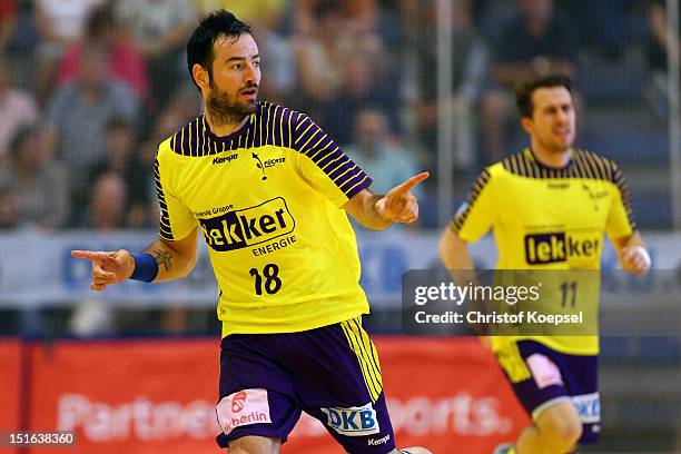 Iker Romero Fernandez of Berlin celebrates a goal during the DKB Handball Bundesliga match between TUSEM Essen and Fueches Berlin at the Sportpark Am...