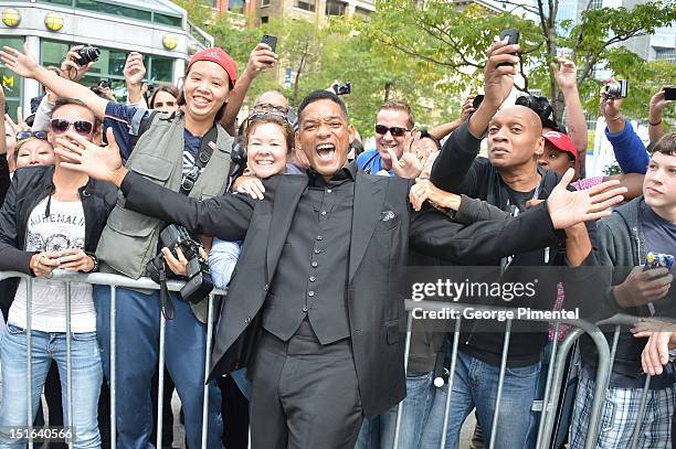 Producer Will Smith has fun with fans at the "Free Angela & All Political Prisoners" premiere during the 2012 Toronto International Film Festival at...