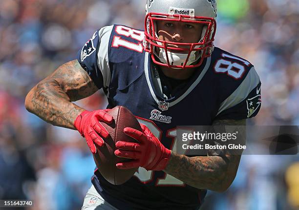 New England Patriots tight end Aaron Hernandez runs into the Titan end zone for the first Patriots touchdown of the game in the first quarter of the...