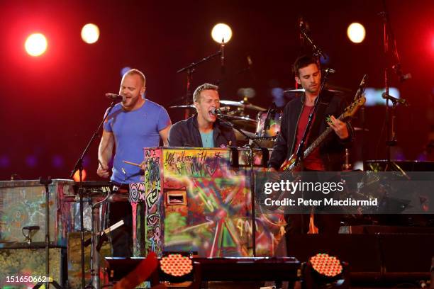 Guy Berryman, Chris Martin and Jonny Buckland of Coldplay perform during the closing ceremony on day 11 of the London 2012 Paralympic Games at...