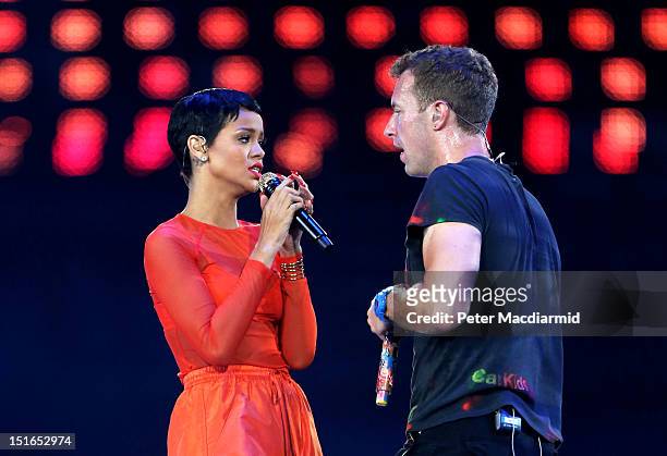 Rihanna performs with Chris Martin of Coldplay during the closing ceremony on day 11 of the London 2012 Paralympic Games at Olympic Stadium on...