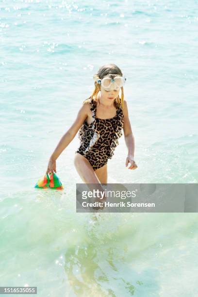 girl on holiday - cheetah print stock pictures, royalty-free photos & images
