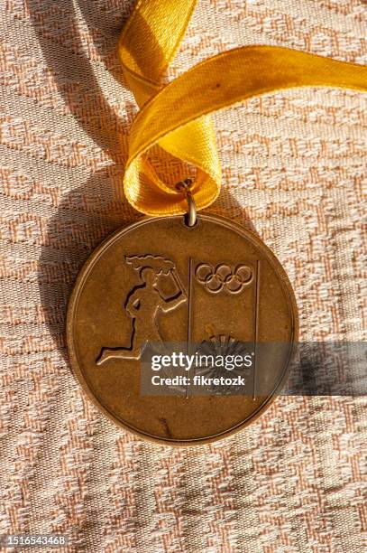 the reverse of a bronze medal from 1972 (xx olympic games) - sports memorabilia show stock pictures, royalty-free photos & images