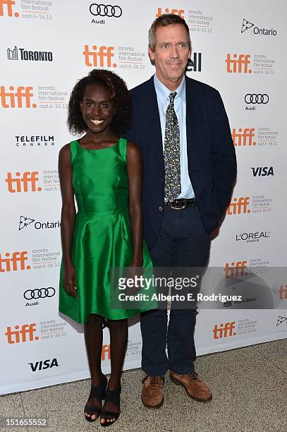 Actors Xzannjah Matsi and Hugh Laurie attend the "Mr. Pip" premiere during the 2012 Toronto International Film Festival at Winter Garden Theatre on...
