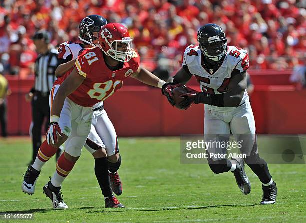 Linebacker Stephen Nicholas of the Atlanta Falcons intercepts a pass intended for tight end Tony Moeaki of the Kansas City Chiefs during the fourth...