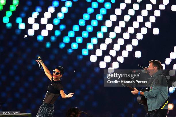 Rihanna, Jay-Z and Chris Martin of Coldplay perform during the closing ceremony on day 11 of the London 2012 Paralympic Games at Olympic Stadium on...