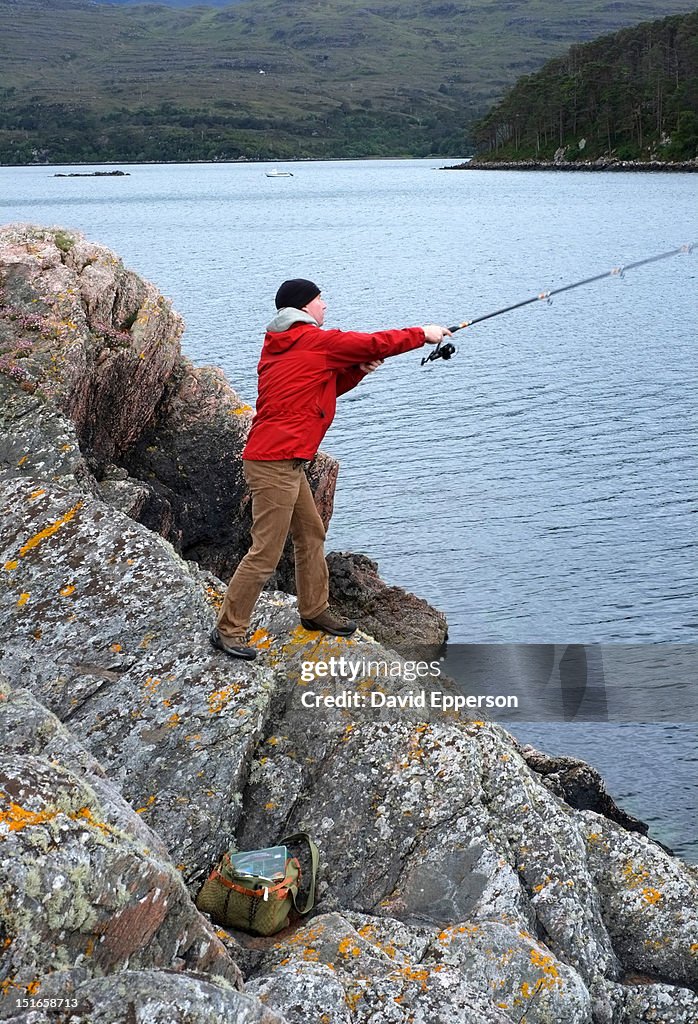 Man sea fishing in Western Scottland