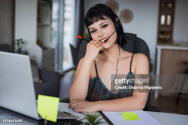 girl working with headset on - girl power stickers stock pictures, royalty-free photos & images