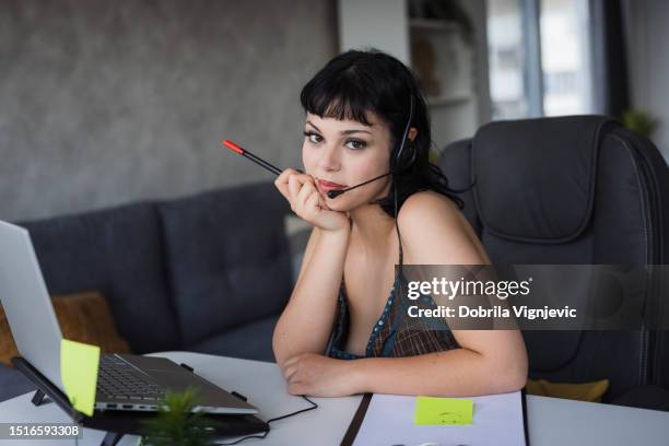 girl working with headset on - girl power stickers stock pictures, royalty-free photos & images