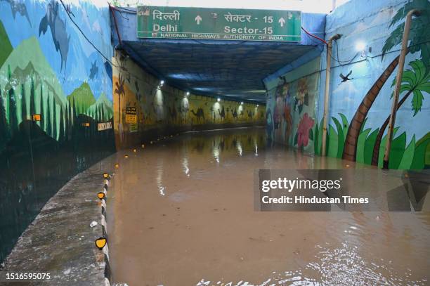 View of closed Rajiv Chowk underpass as water gets logged inside the tunnel following heavy monsoon rains, near Tau Devi Lal Stadium, on July 9, 2023...