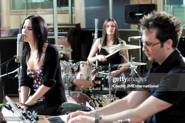 Andrea Corr, Caroline Corr and Jim Corr at The Corrs EPK photo shoot, Air Studios, Lyndhurst Hall, London, 16th June 2000.