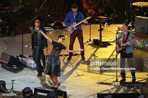 Jay-Z and Rihanna perform with Will Champion and Chris Martin of Coldplay during the closing ceremony on day 11 of the London 2012 Paralympic Games...