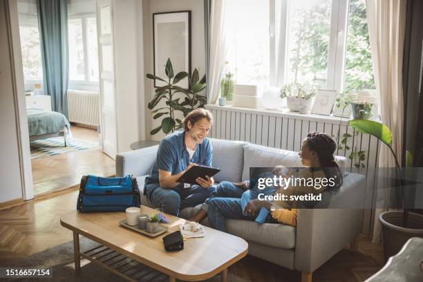 pediatrician at home visit - house call stock pictures, royalty-free photos & images