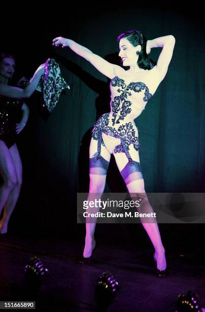 Dita Von Teese performs at a performance by Dita Von Teese at The Arts Club on September 9, 2012 in London, England.