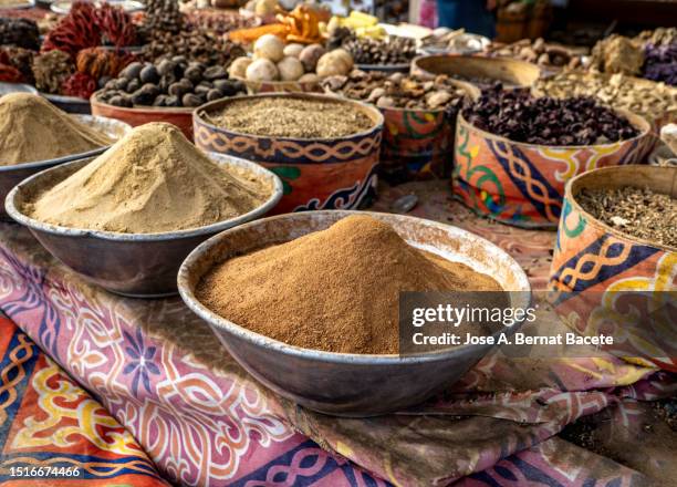 market stall with spices and condiments, nubian market, aswan, egypt - aswan fotografías e imágenes de stock