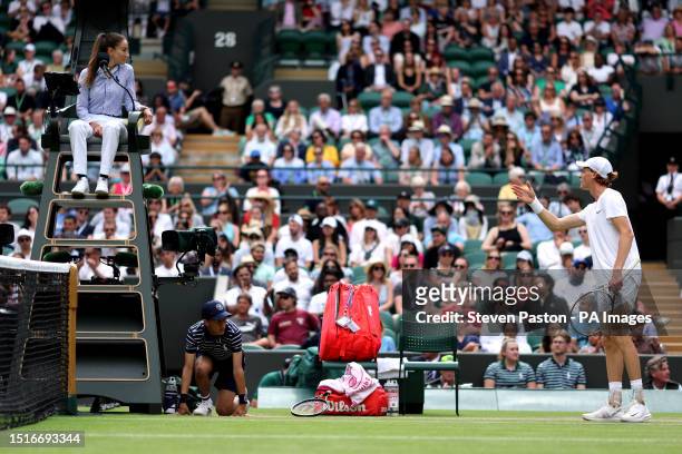 Jannik Sinner speaking with the Chair umpire Marijana Veljovic during his match against Daniel Elahi Galan on day seven of the 2023 Wimbledon...