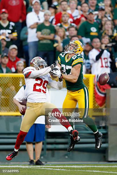 Chris Culliver of the San Francisco 49ers breaks up a fourth down pass intended for Jordy Nelson of the Green Bay Packers during the game at Lambeau...