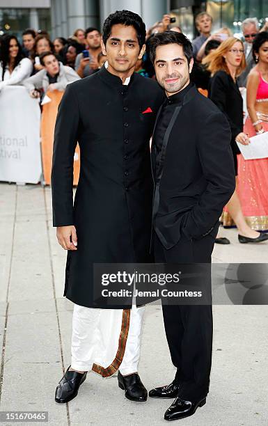 Actors Siddharth and Satya Bhabha arrive at the "Midnight's Children" Premiere at the 2012 Toronto International Film Festival at Roy Thomson Hall on...