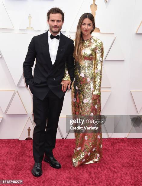 Jamie Dornan and Amelia Warner at the 94th Academy Awards held at Dolby Theatre at the Hollywood & Highland Center on March 27th, 2022 in Los...