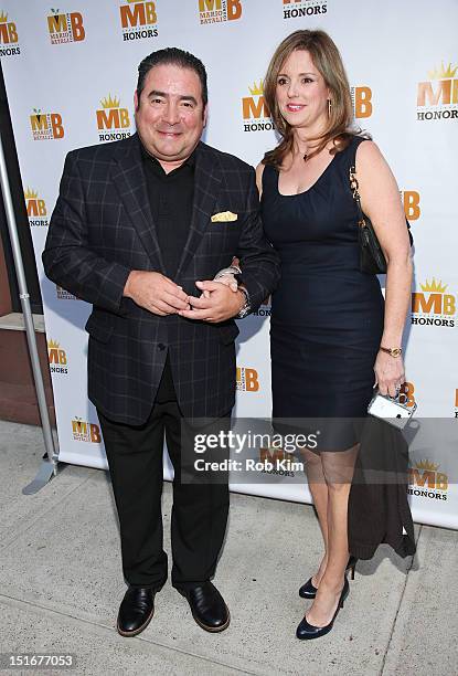Chef Emeril Lagasse and wife Alden Lovelace attend The Mario Batali Foundation Inaugural Honors Dinner at Del Posto Ristorante on September 9, 2012...