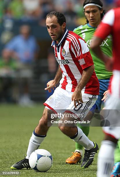 Nick LaBrocca of Chivas USA dribbles against the Seattle Sounders FC at CenturyLink Field on September 8, 2012 in Seattle, Washington.