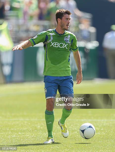 Brad Evans of the Seattle Sounders FC dribbles against Chivas USA at CenturyLink Field on September 8, 2012 in Seattle, Washington.