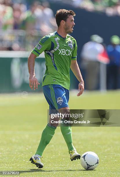 Brad Evans of the Seattle Sounders FC dribbles against Chivas USA at CenturyLink Field on September 8, 2012 in Seattle, Washington.