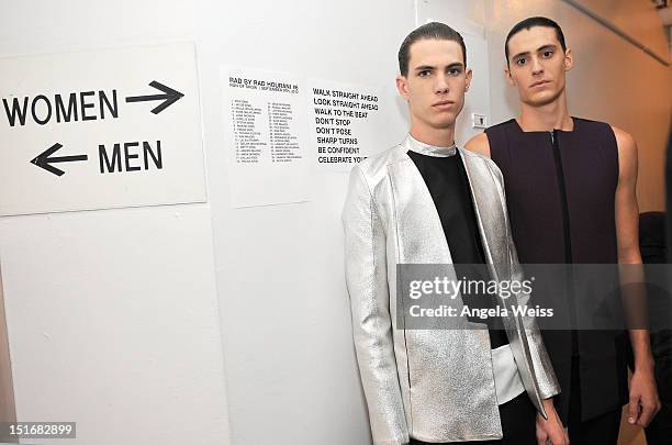 Models pose backstage at the Rad by Rad Hourani Unisex Collection spring 2013 fashion show during Mercedes-Benz Fashion Week at Studio 450 on...