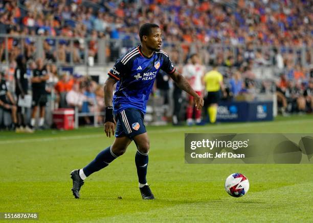 Alvas Powell of FC Cincinnati looks to pass during a MLS soccer match against the New England Revolution at TQL Stadium on July 01, 2023 in...